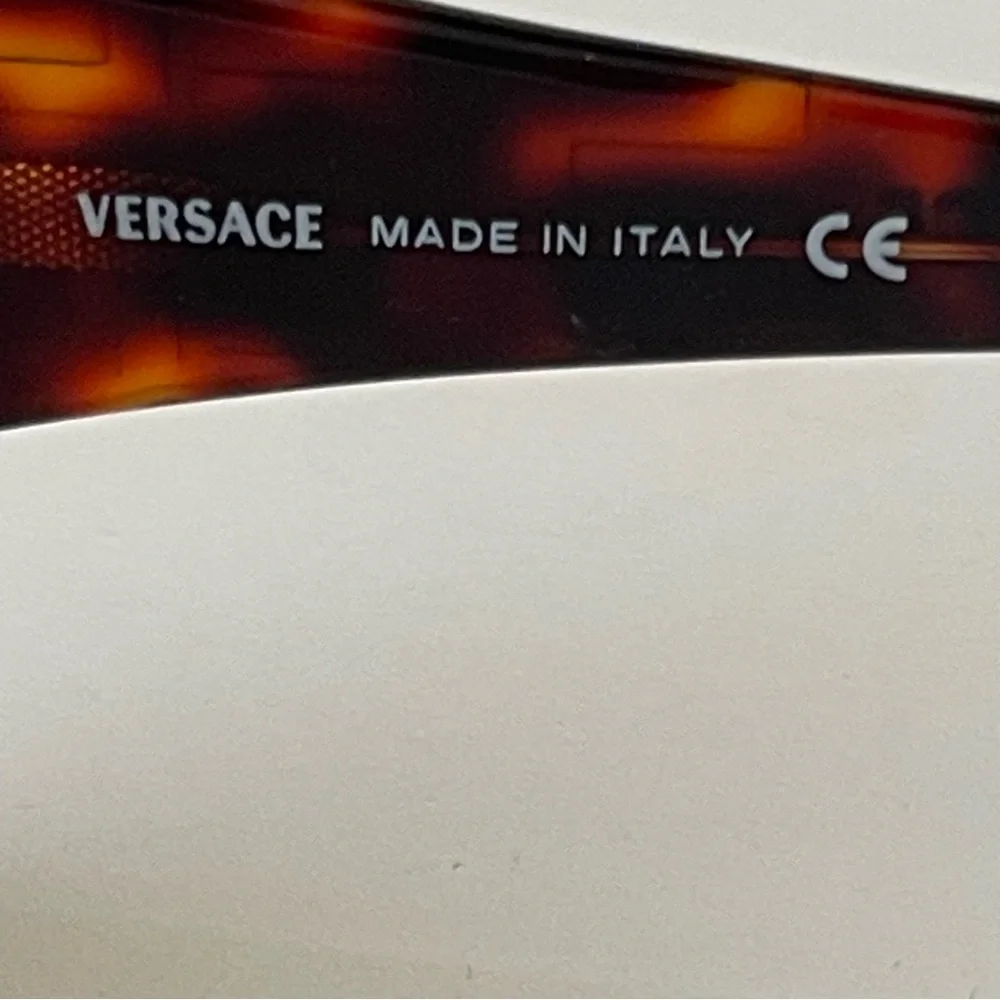 VERSACE  Y2K sunglasses wrapped around brown